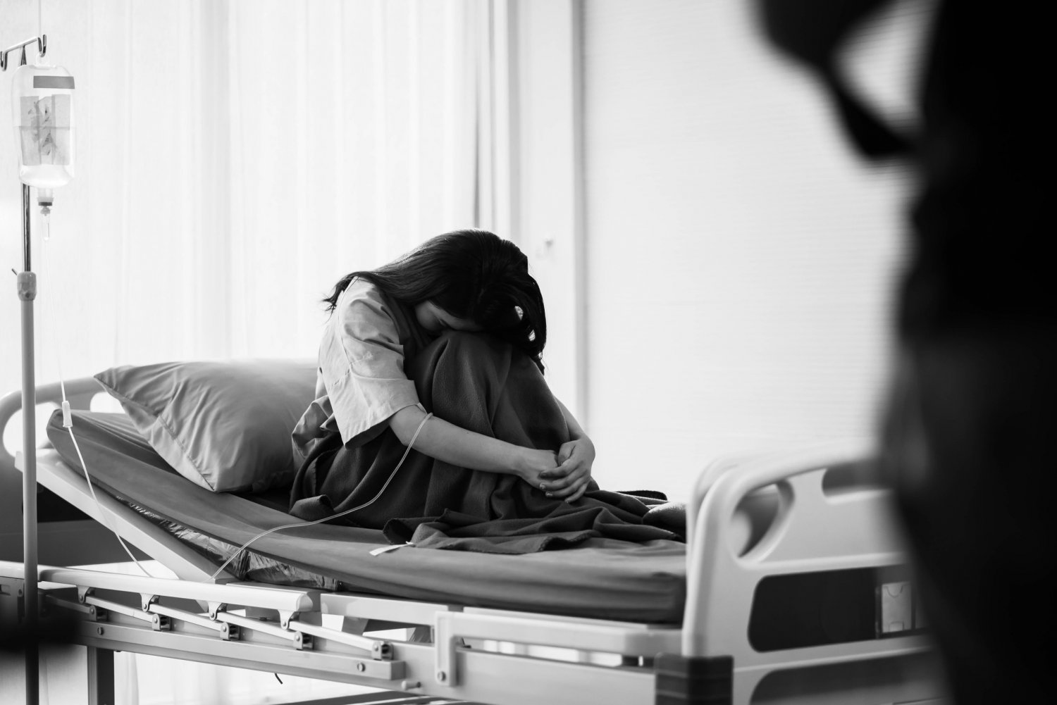 Kobieta na szpitalnym łóżku