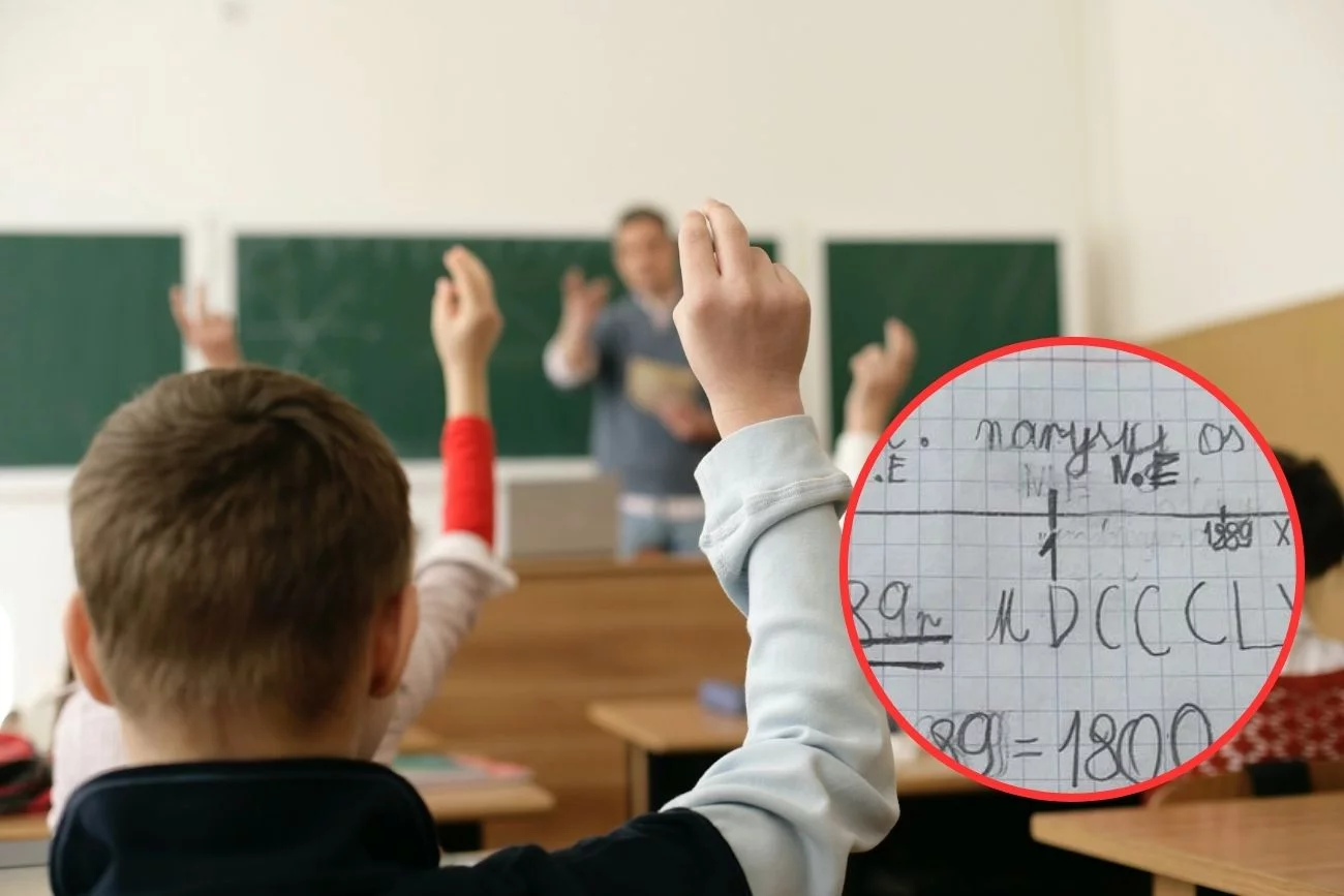 Uczniowie podczas lekcji zgłaszają się do odpowiedzi.