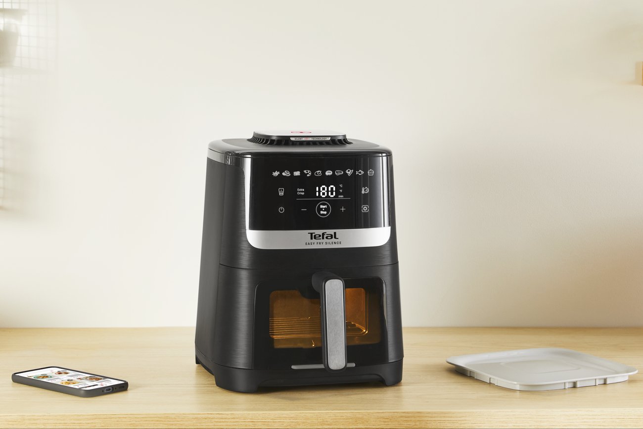 Tefal Easy Fry Silence Vision XL to wyjątkowo cicha frytkownica beztłuszczowa z 10 programami automatycznymi i zwiększającą chrupkość potraw funkcją Extra-Crisp.