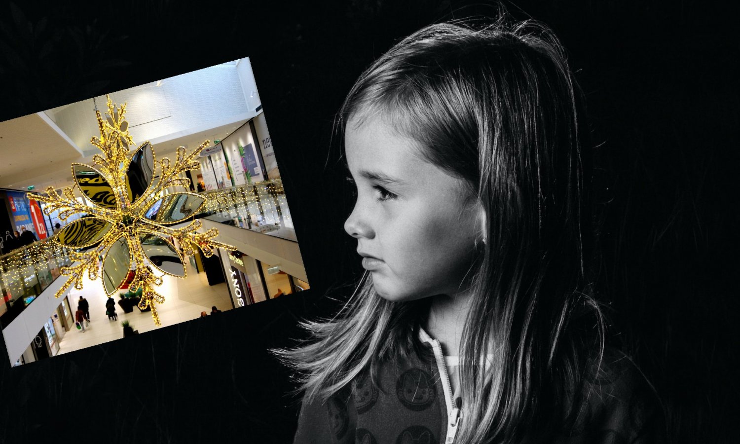 Dziewczynka smutna, obok centrum handlowe w święta.