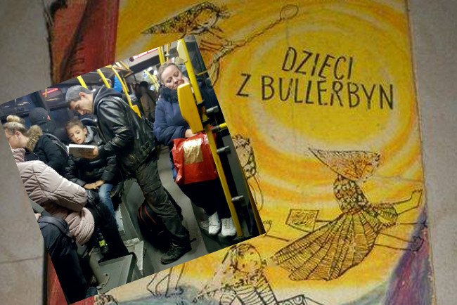 Tata czyta dziecku w autobusie "Dzieci z Bullerbyn"